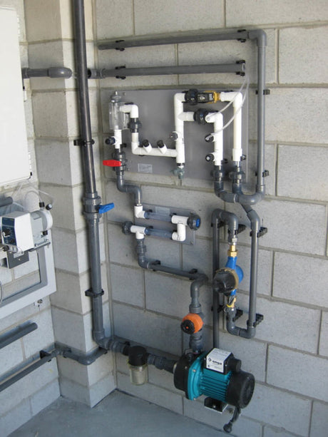 Custom Manifold incorporating Coupon Rack, Water Meter & Recirc Pump